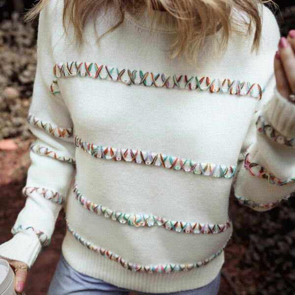 Get cozy in this chic but comfy Crossed Rainbow Stitch Sweater! Featuring a fashionable stitch pattern in all the latest styles