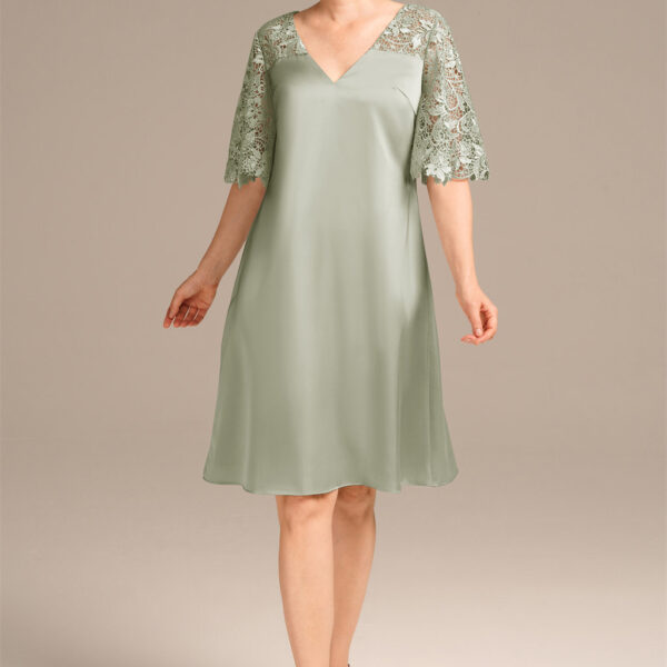where knee-length elegance and a v-neck allure blend for the perfect toast.