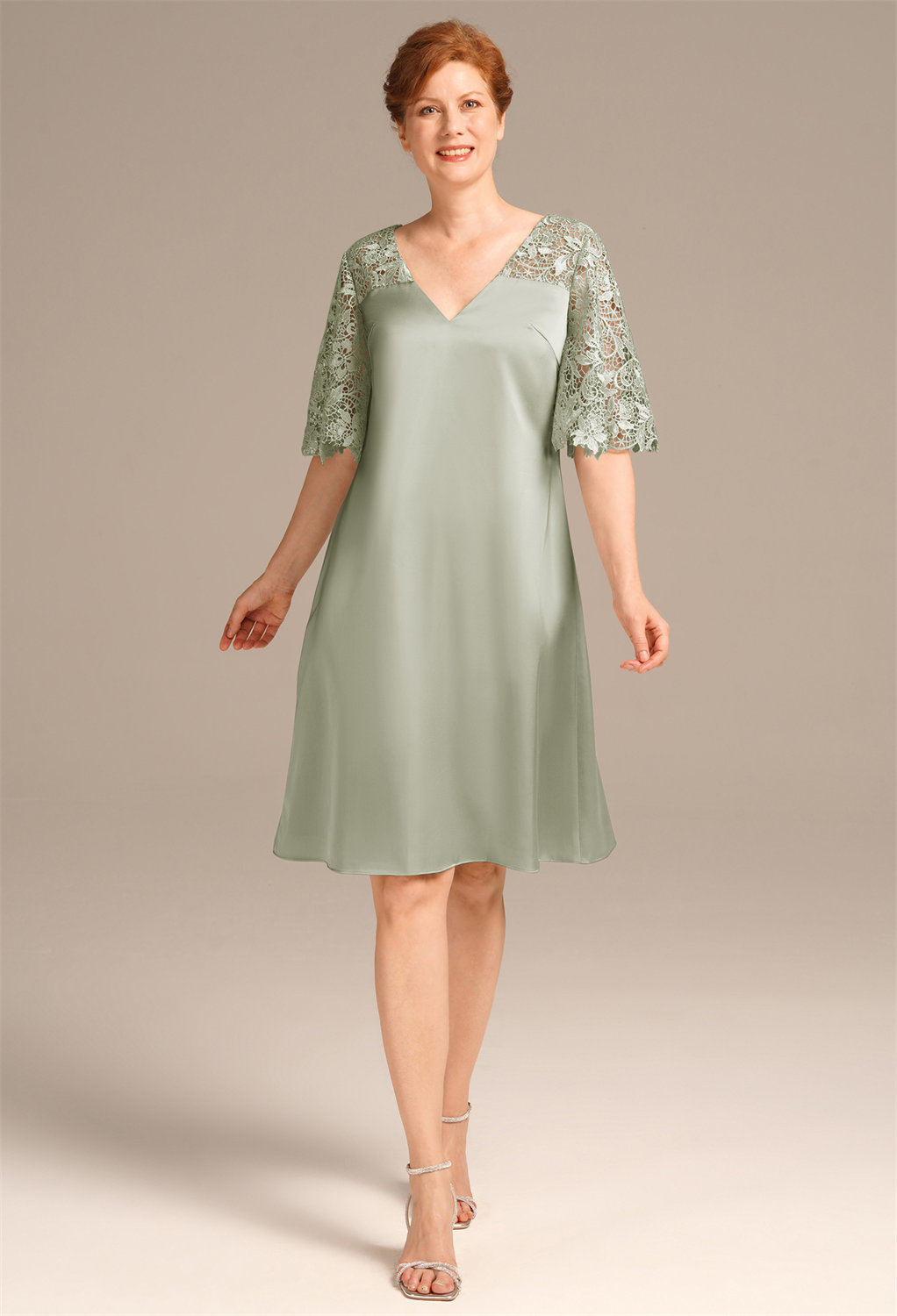 where knee-length elegance and a v-neck allure blend for the perfect toast.