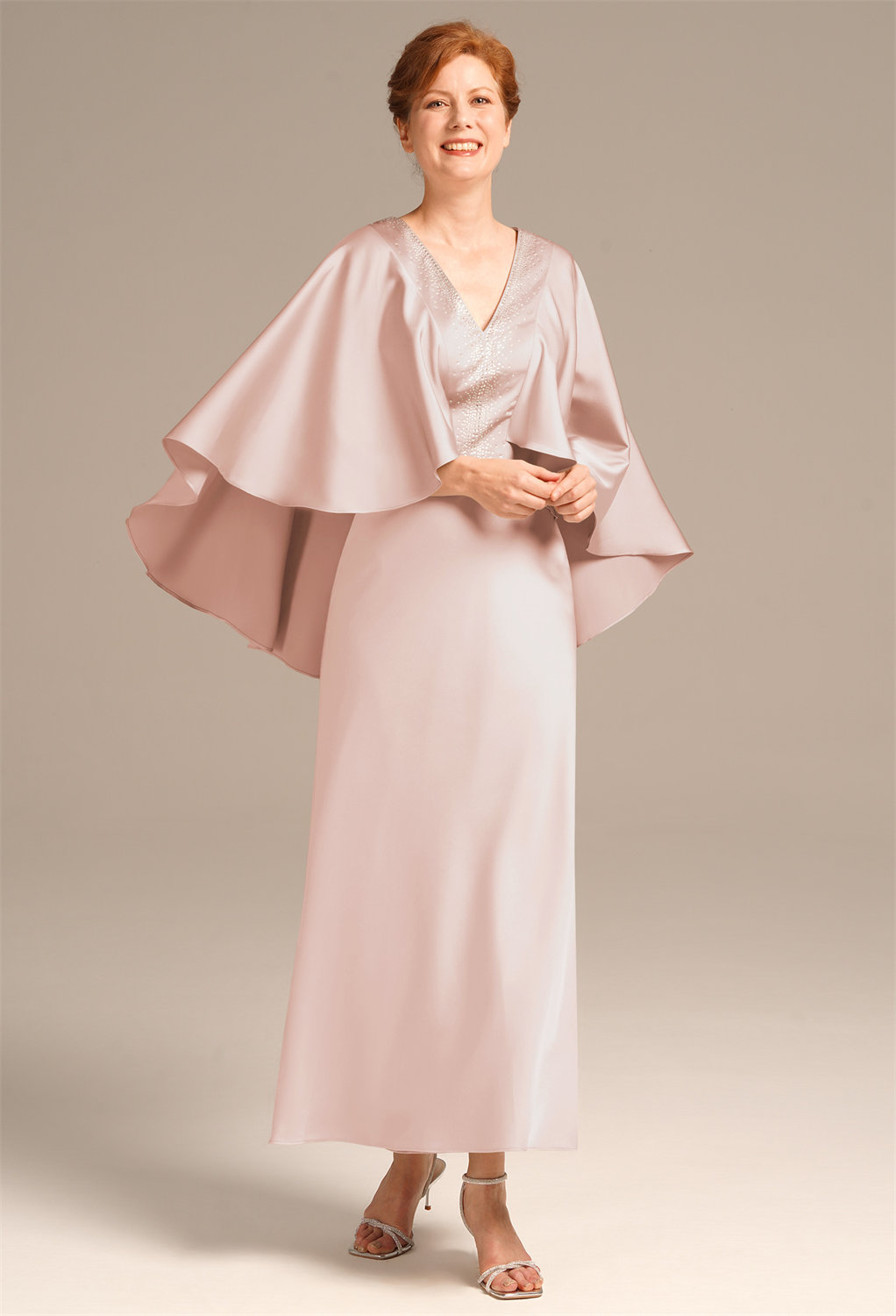 cut at ankle length with a v-neck to accentuate timeless allure.