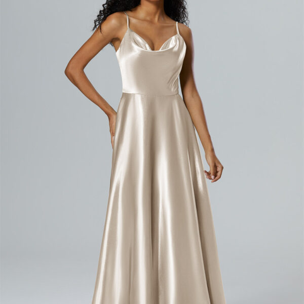 this floor-length dress casts a stunning silhouette with its A-line design. The asymmetrical neckline adds a distinctive flair