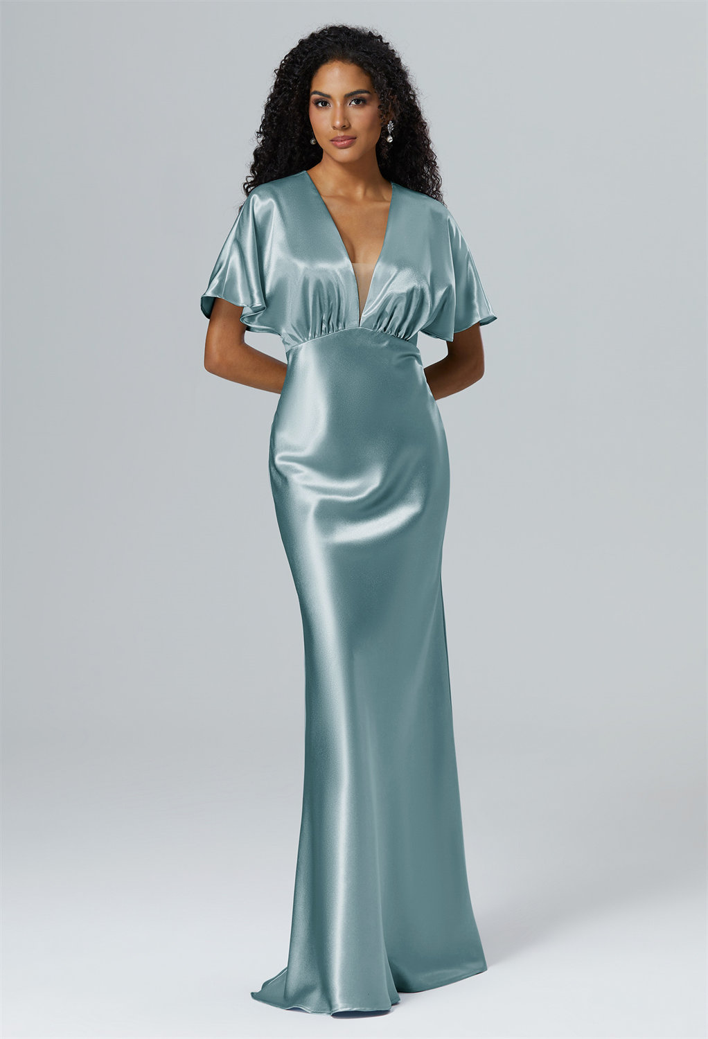 and an A-line skirt that tells a tale of grace with every floor-kissing hemline.