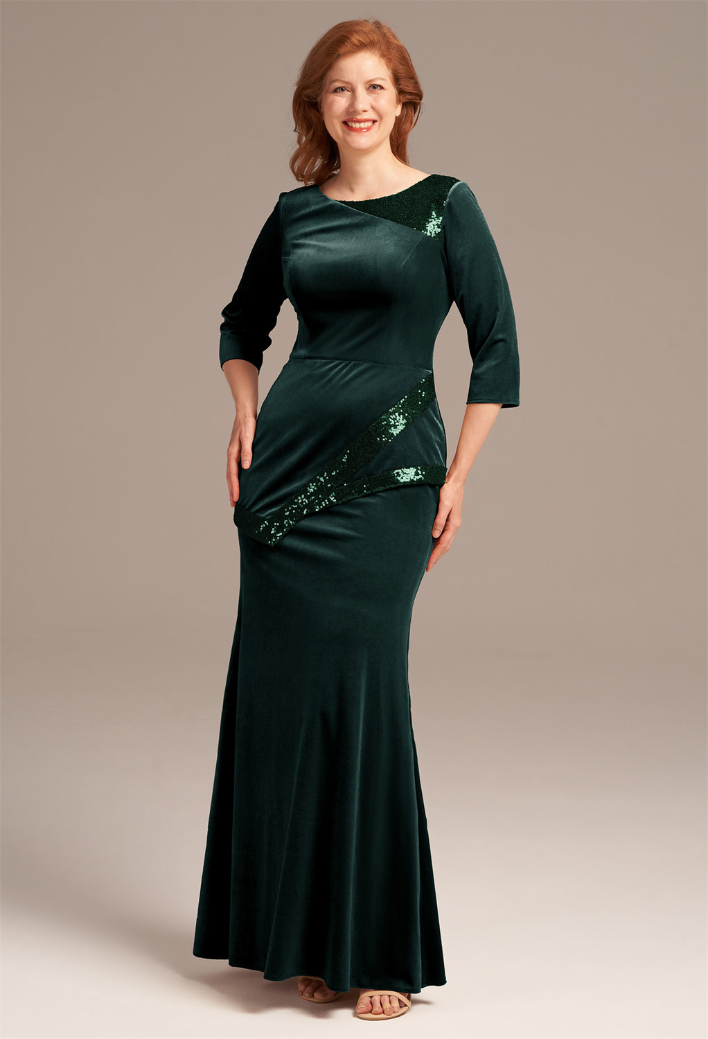 a mermaid-style mother of the bride dress that skims the floor and is crowned with a jewel neckline for real elegance.