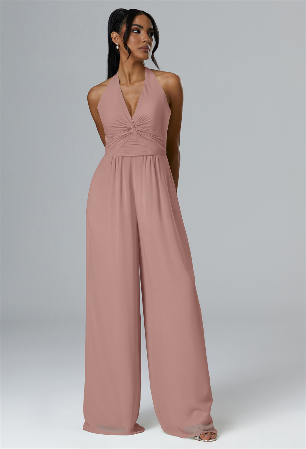 this sleeveless piece offers comfort with built-in bra pads and a back zipper closure. Perfect for any occasion