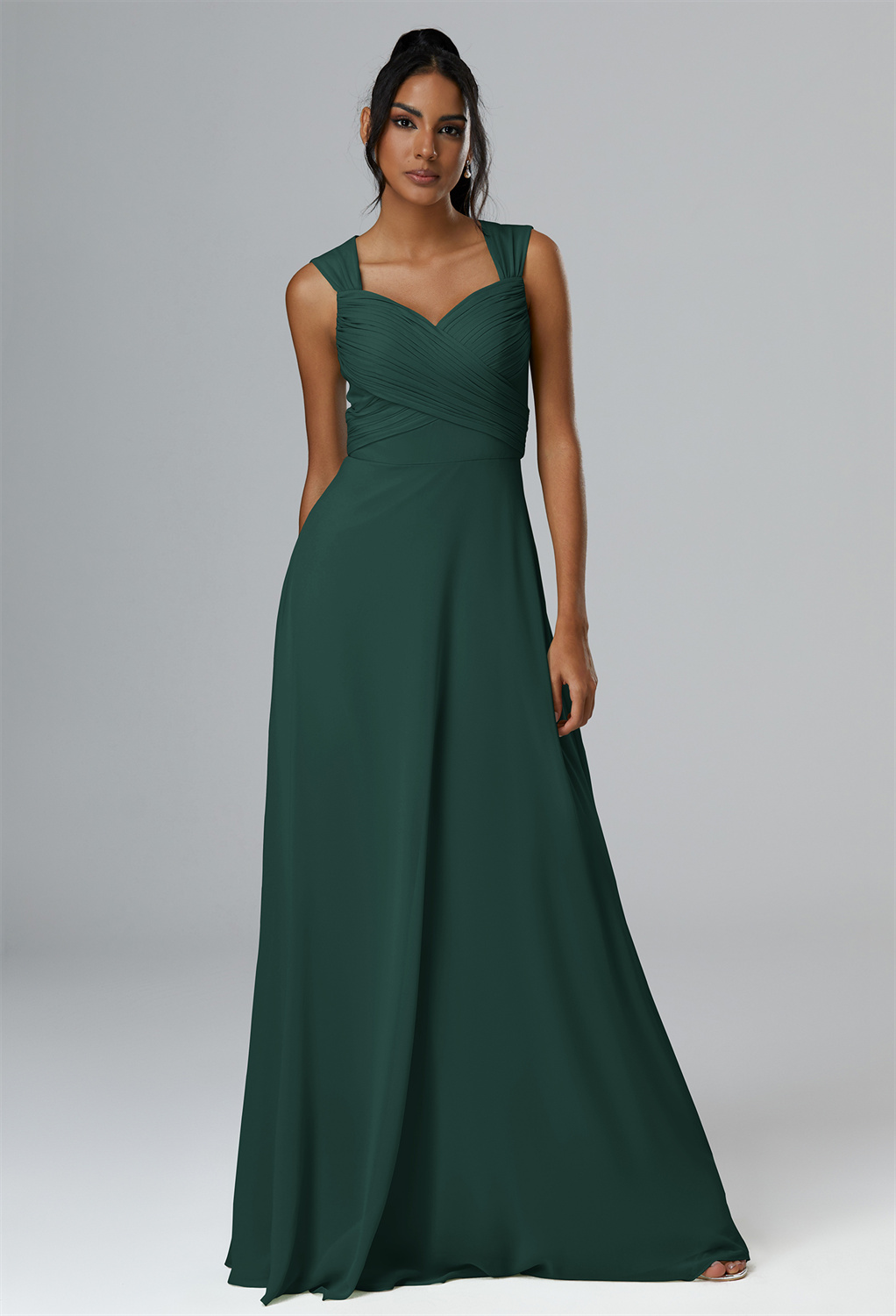 crafted in delicate chiffon with a bodice that gracefully hugs the figure