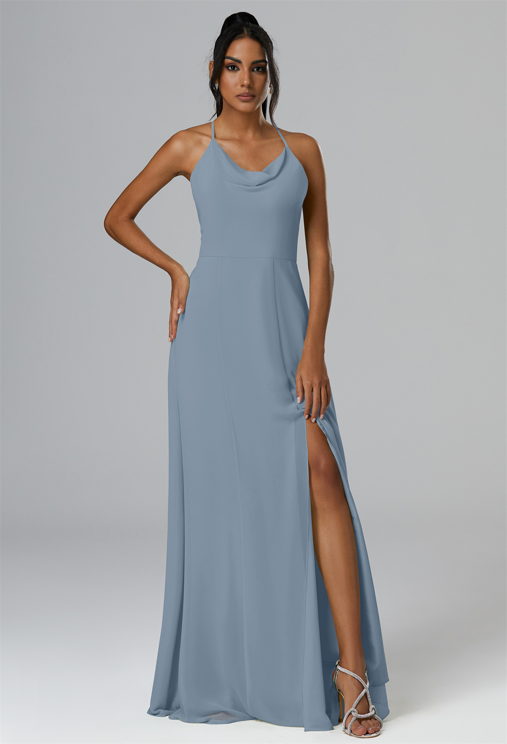 while the asymmetrical neckline adds a modern twist to this floor-length chiffon bridesmaid dress