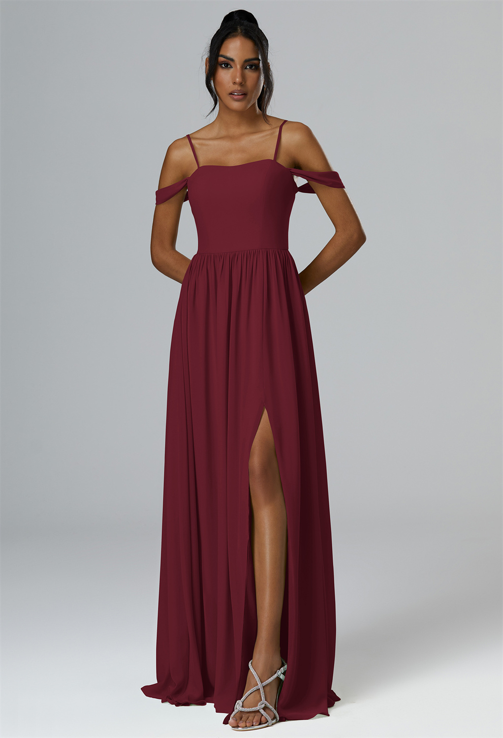 with an A-line cut that cascades to a full floor-length hem