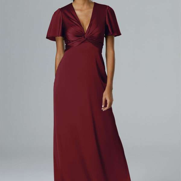 this floor-length A-line dress combines a V-neck design with effortless grace for a ceremonial spectacle.