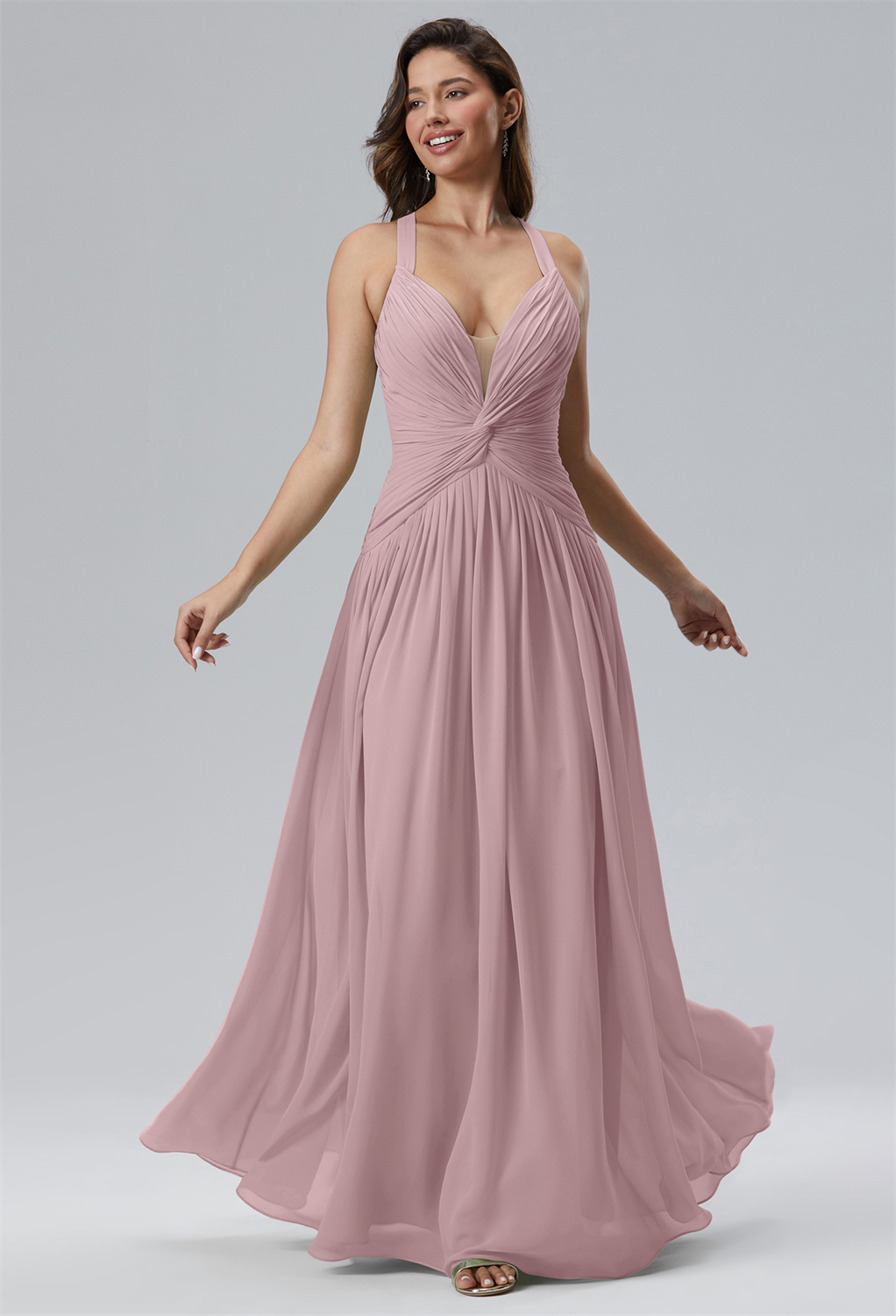 This A-line floor-length dress features a mesmeric sweetheart neckline with a refined fit built-bra to provide that feminine finesse to the bodice. It has a fine cross-cut back finish that builds an elegant aura with every step.