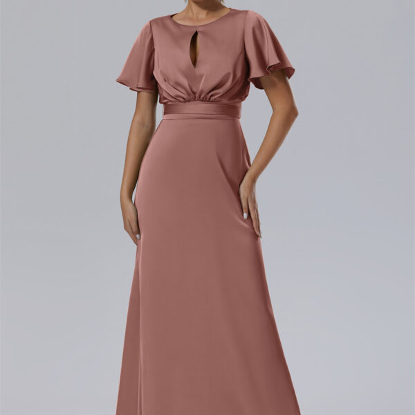 adding a playful yet sensual touch to the otherwise understated elegance of the gown. The gown's adjustable waist belt is designed to perfectly contour to one's curves