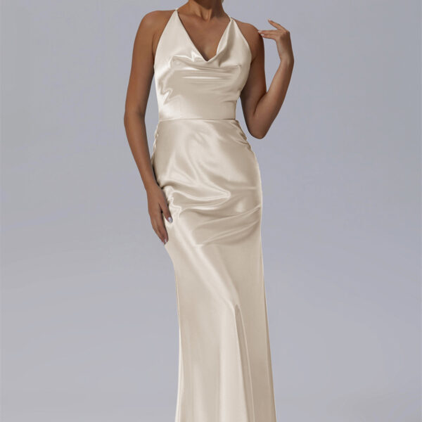 this full-length gown presents a breathtaking A-line shape. Its unique asymmetrical neckline contributes a touch of individuality