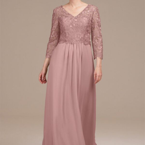this dress showcases a tasteful V-neck and 3/4 sleeves for a touch of sophistication. Applique accents enhance its charm
