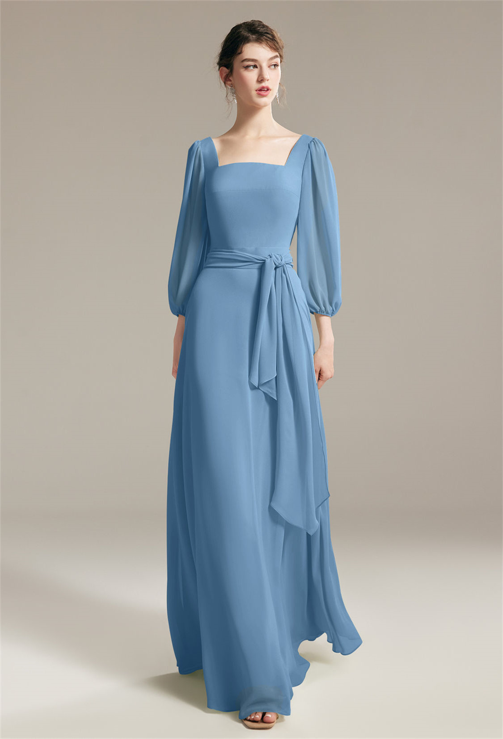 featuring a classic square neckline. The 3/4 sleeves add a touch of sophistication
