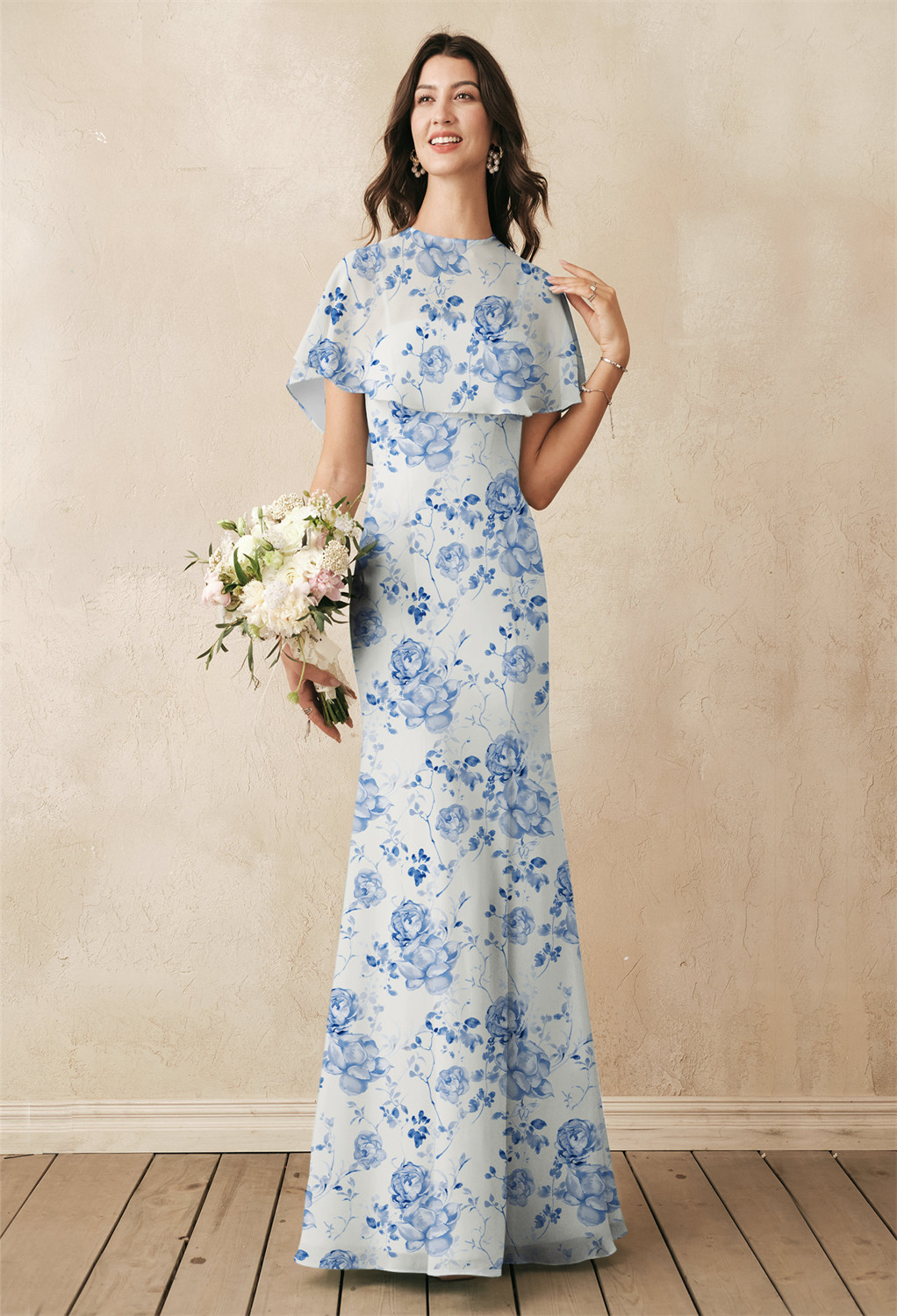 The mermaid fit of the chiffon Myra dress makes this a floor-length bridal gown to remember. The flattering fit pairs perfectly with the square neckline that gives you the demure look you want for your wedding day. Add a pair of classic heels dyed to matc