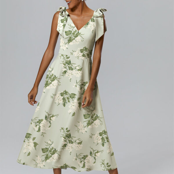 highlighting the effortless and feminine vibe to the dress.