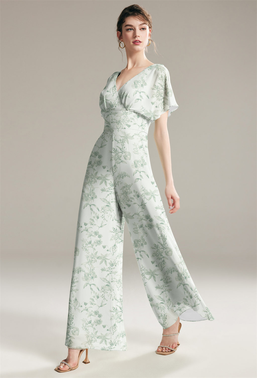 bridesmaid jumpsuit is designed from beautiful chiffon fabric with a sweetheart neckline and floor-length hemline. The zipper adds uniqueness while the cape top and strapless design create a trendy look. The built-in bra lining ens
