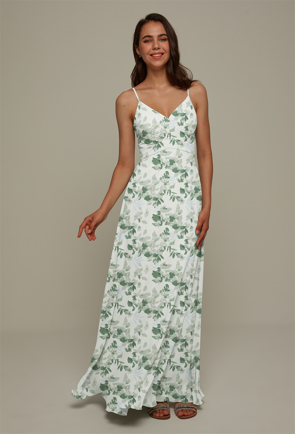 for a romantic look that is simply perfect for a spring wedding held outdoors in the sunshine. The floor-length of the dress adds to the elegance of