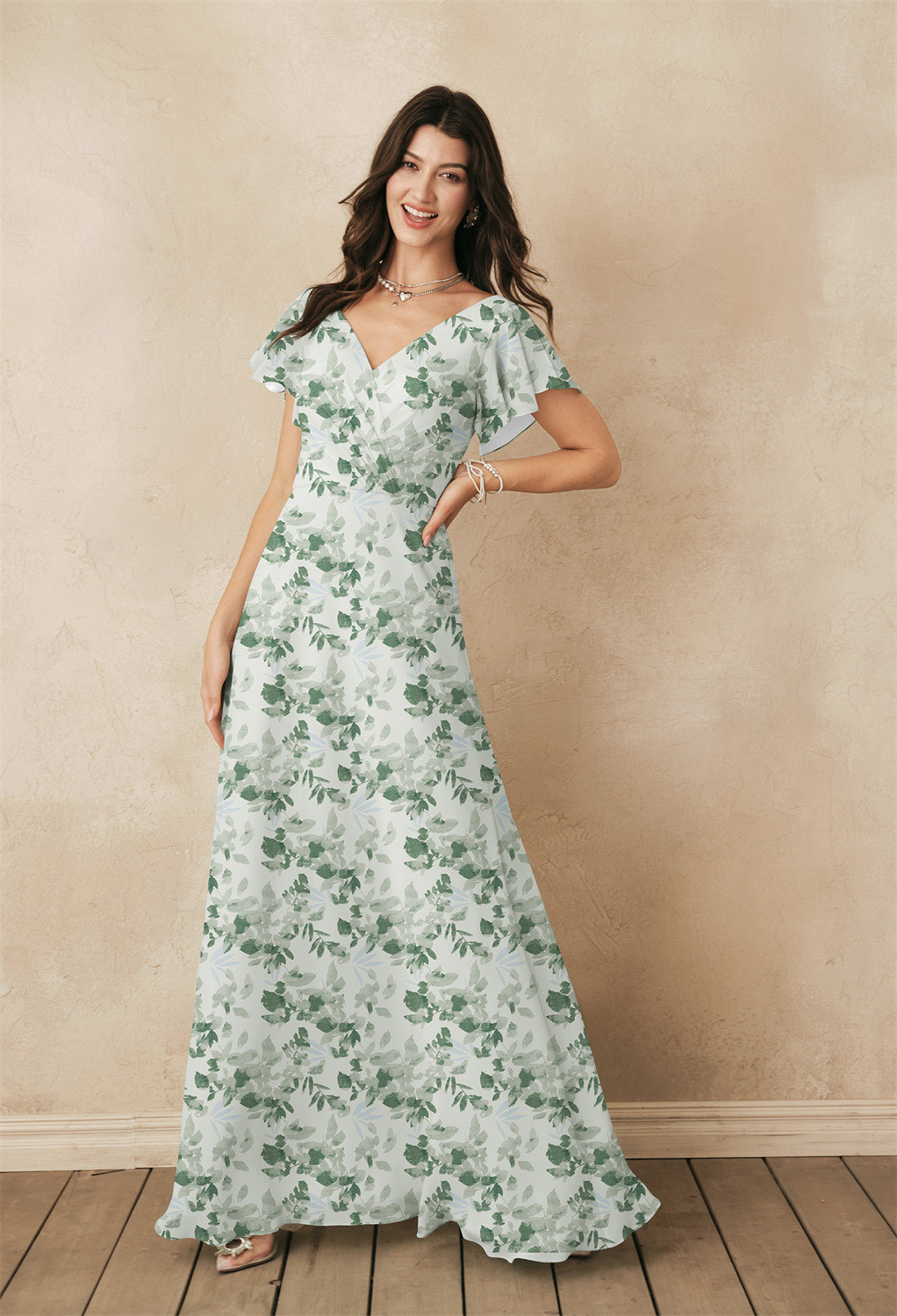 The Mallory dress features flirty butterfly sleeves and a pretty V-neck that pairs well with the charming look of the bodice. The floor-length chiffon dress is flattering and provides todayu2019s trendsetting bride with the classic and romantic look she w