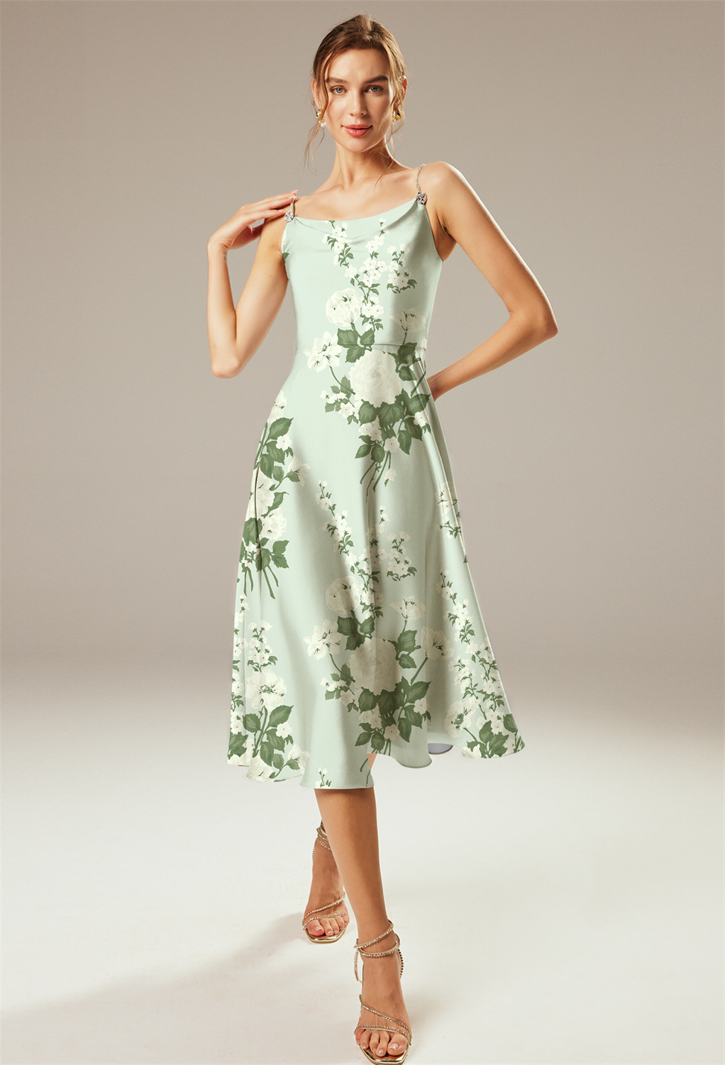spaghetti strap dress. It features a fitted built-in bra