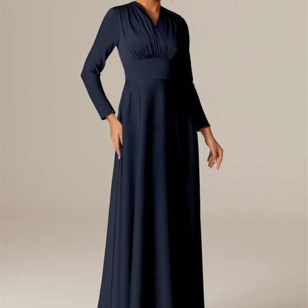 the floor-sweeping Satin Charmeuse gown cuts a stunning A-line silhouette