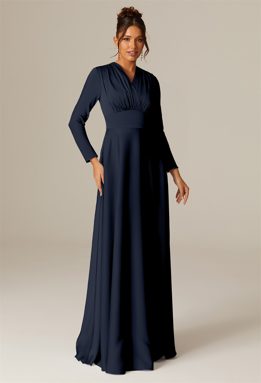 the floor-sweeping Satin Charmeuse gown cuts a stunning A-line silhouette