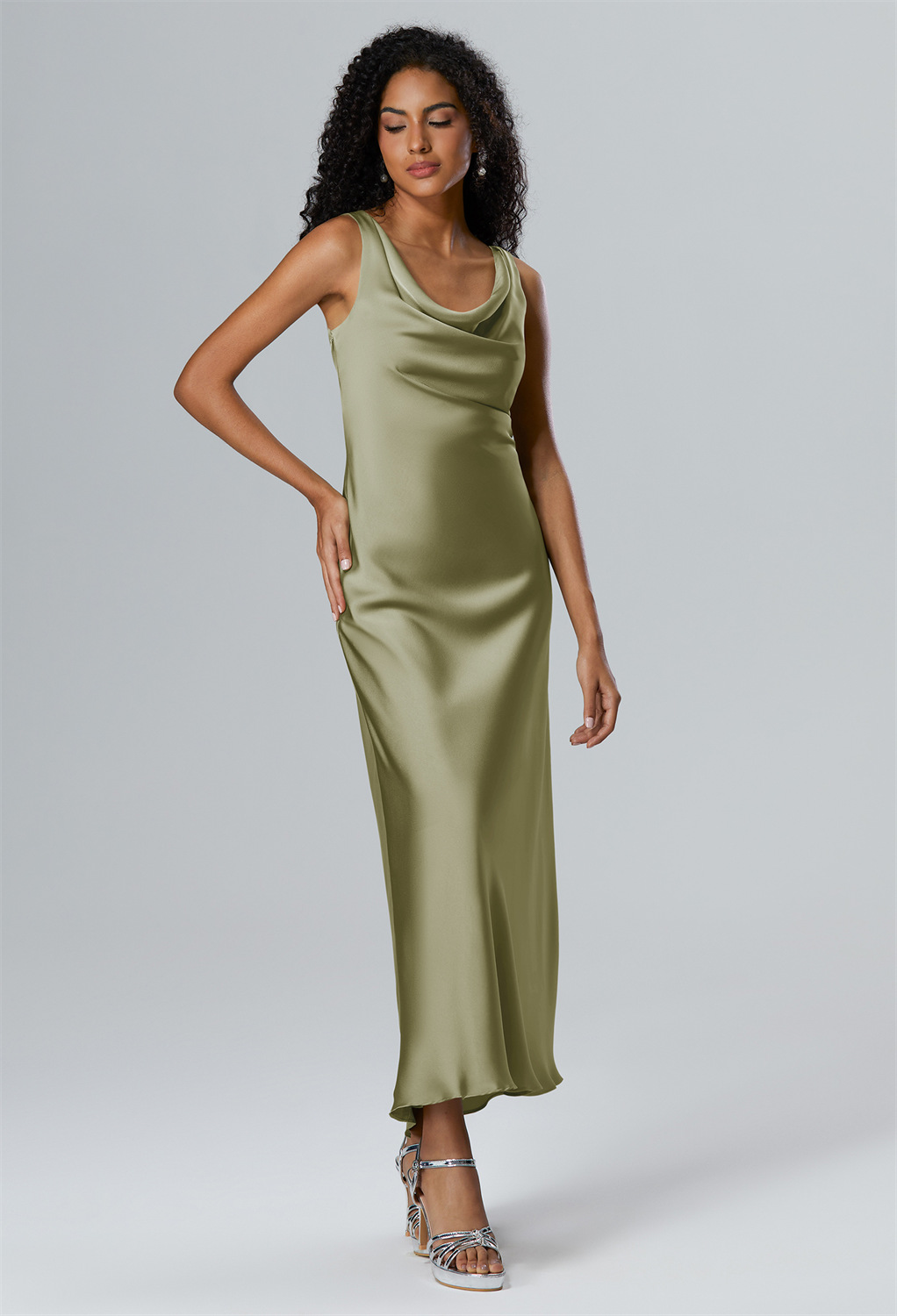 as the A-line shape gently sweeps to ankle length