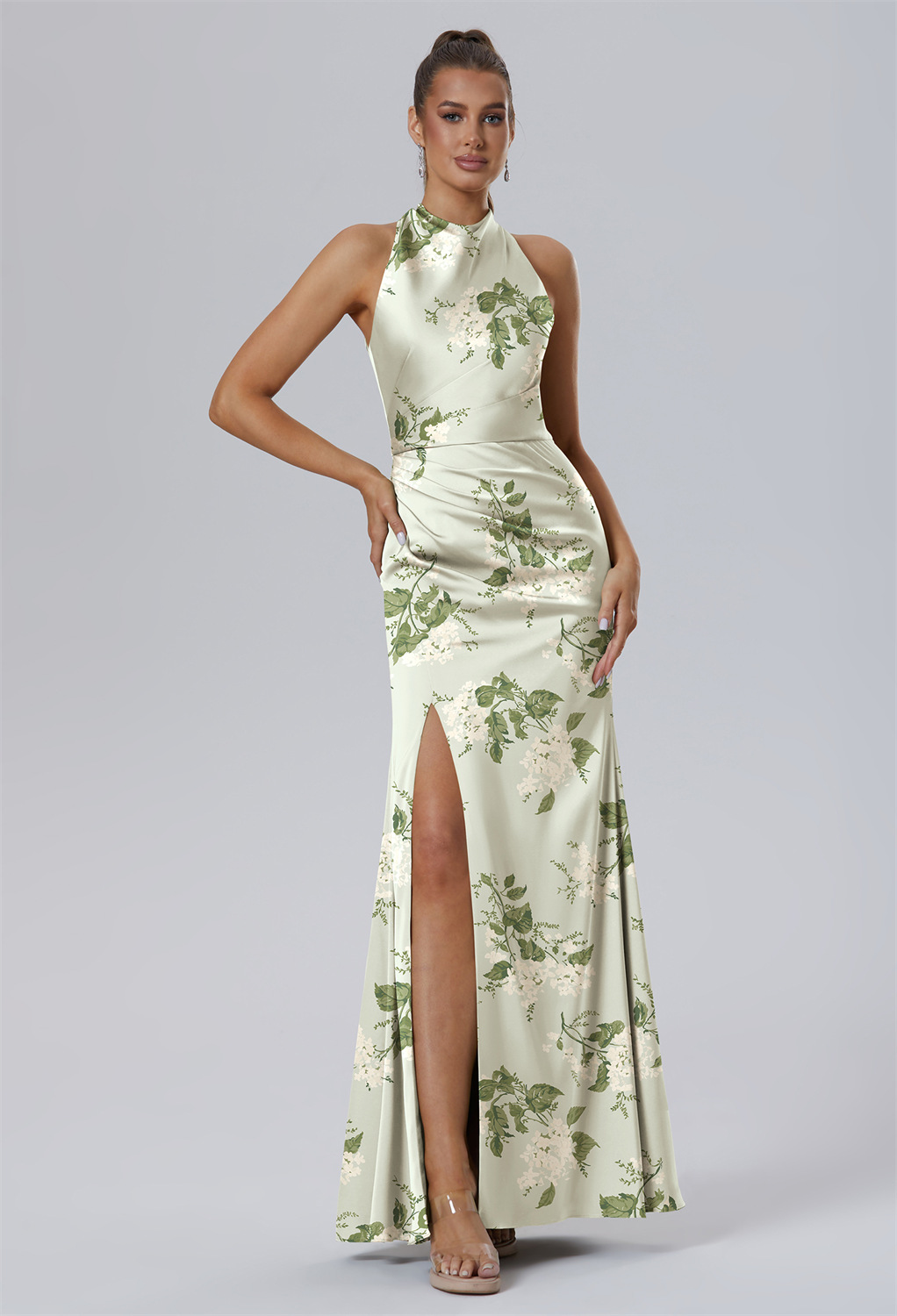 the AW Maharaol Dress is a floor-length ensemble that epitomizes sophistication. This sleeveless mermaid silhouette is defined by a graceful jewel neckline and a sleek zipper at the back. It ensures comfort and supp