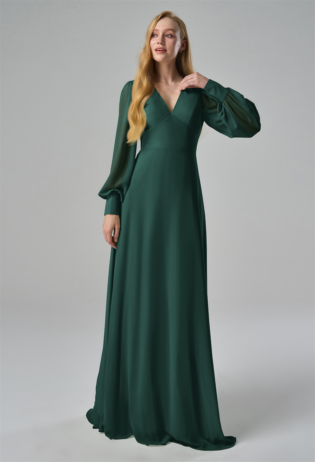 this dress exudes timeless grace. The flowing A-line skirt provides a flattering silhouette