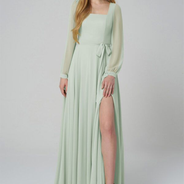 offering a timeless and graceful look. The flowing skirt is enhanced by a high slit