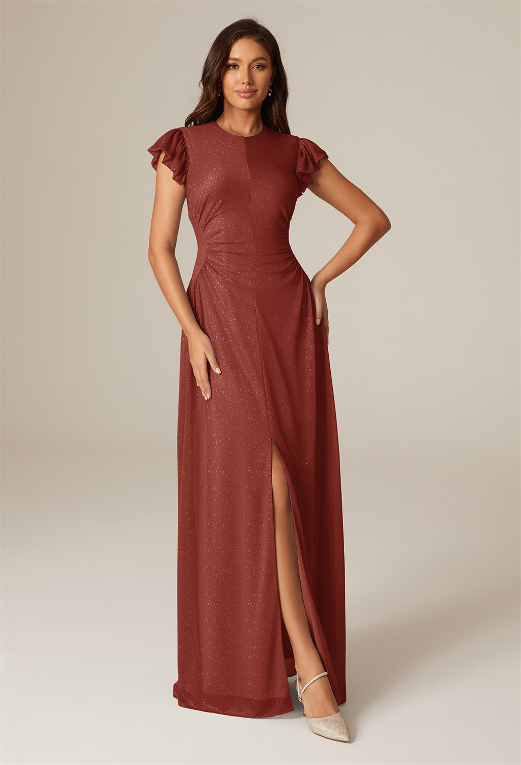You wouldn't imagine how amazing you will be in this floor-length A-line bridesmaid dress with a jewel neckline. The glitter mesh fabric highlights its captivating beauty.