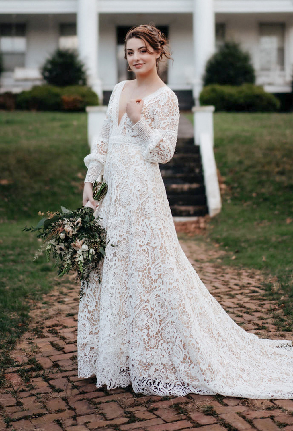 AW Regan Wedding Dress is a stylish lace fabric combining the simple strapless long sleeves and back zipper with a classy V-neck neckline and an A-line silhouette to give a striking outline. AW Regan Wedding Dress is a hot pick for a bride who admires a f
