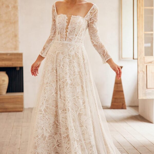 without showing too much skin. The fabric of the dress has a diamond-like ef
