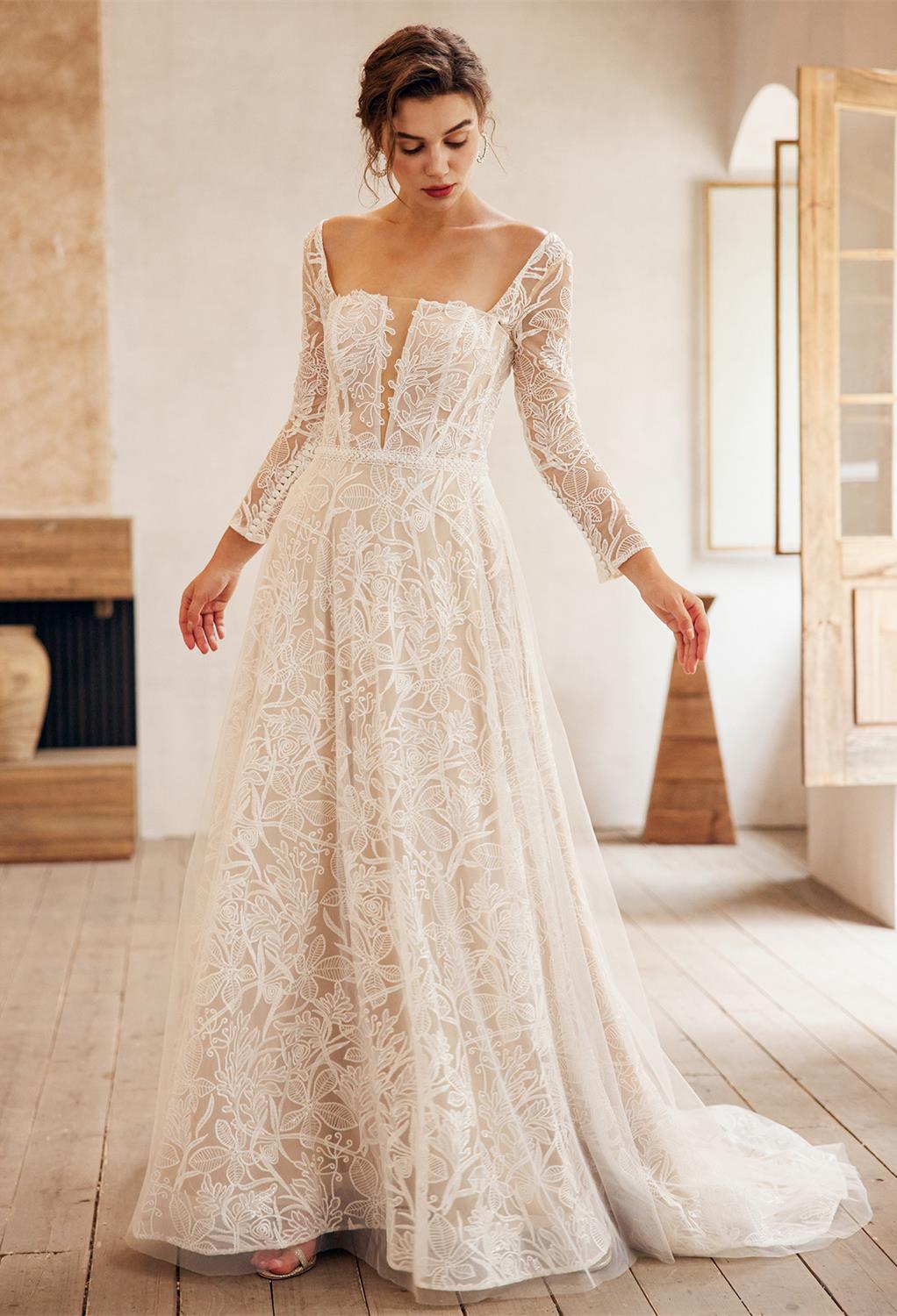 without showing too much skin. The fabric of the dress has a diamond-like ef
