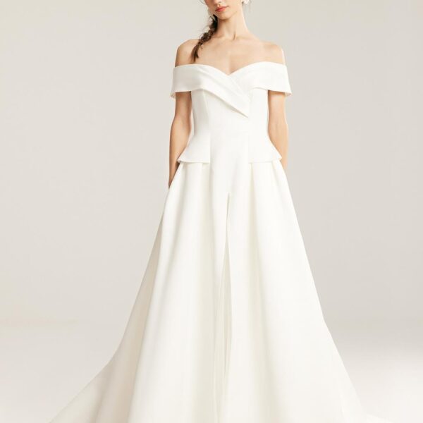 this A-line floor-length wedding dress creates a natural gracefulness with its v-shaped off-shoulder cape neckline. Its bodice hugs the belly int
