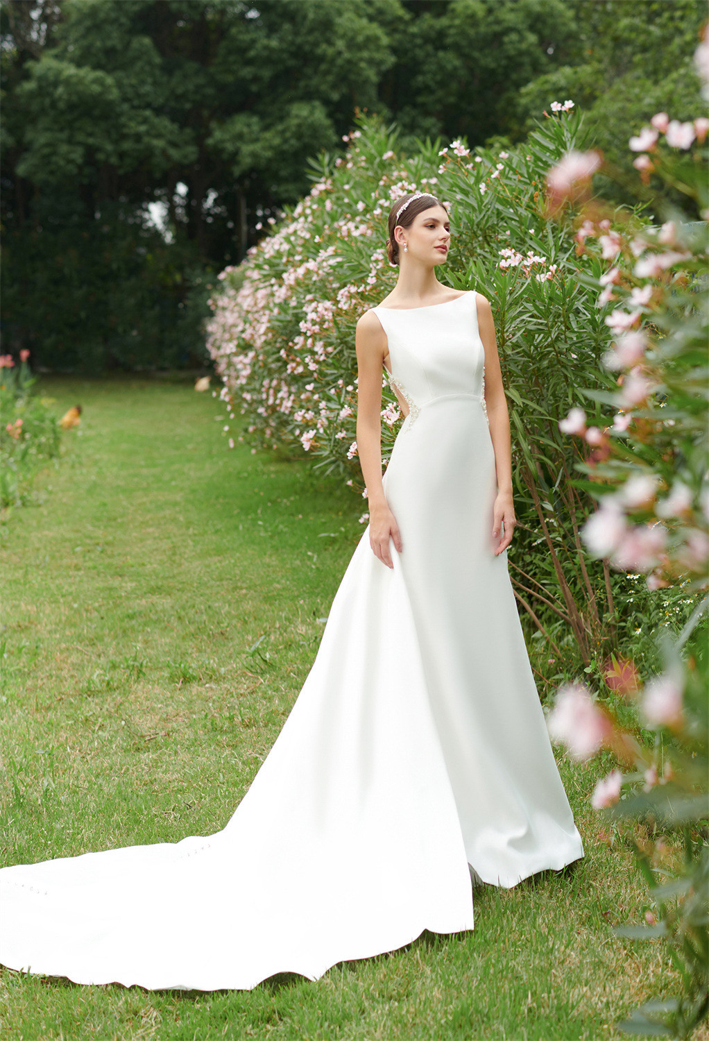 this bridal gown is an embodiment of a rare and magical love. Cut from satin as an A-line floor-length gown