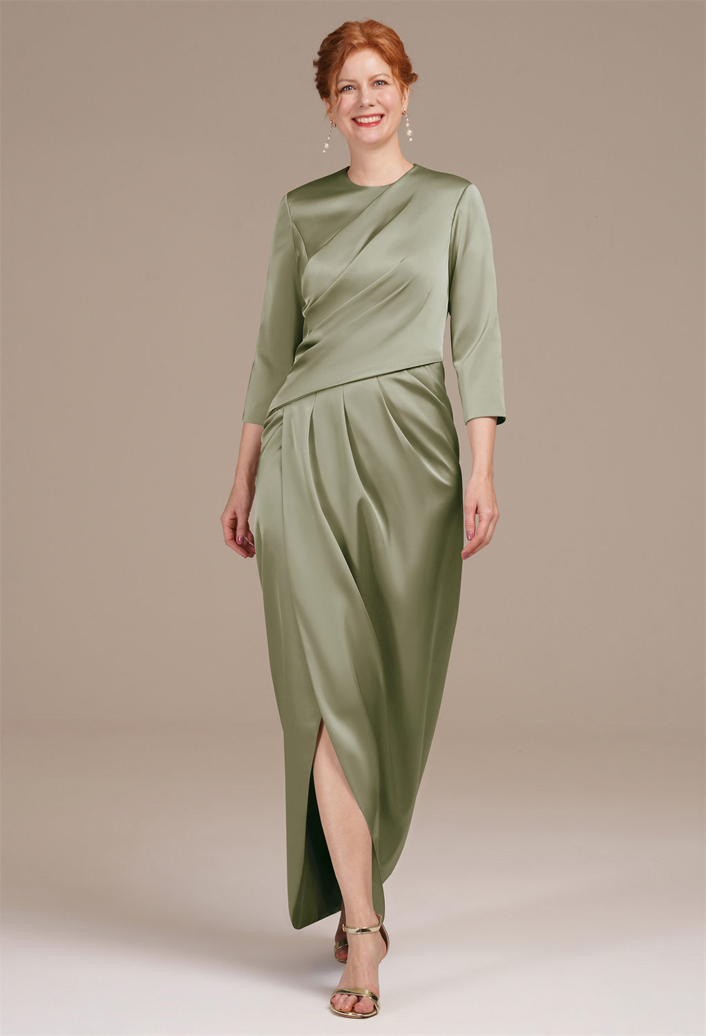 adorned with tasteful pleats for added elegance. The jewel neckline and versatile 3/4 sleeves exude sophistication