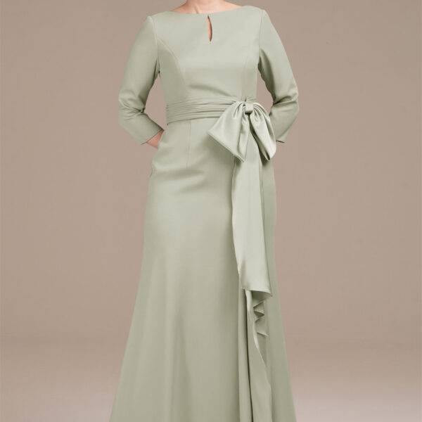 while the cinched waist is highlighted by a charming bow embellishment. Perfect for formal occasions