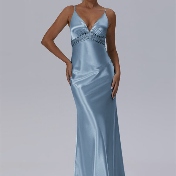 showcasing delicate spaghetti straps and a flattering V-neckline. Its high-waist design gracefully transitions into a mermaid silhouette