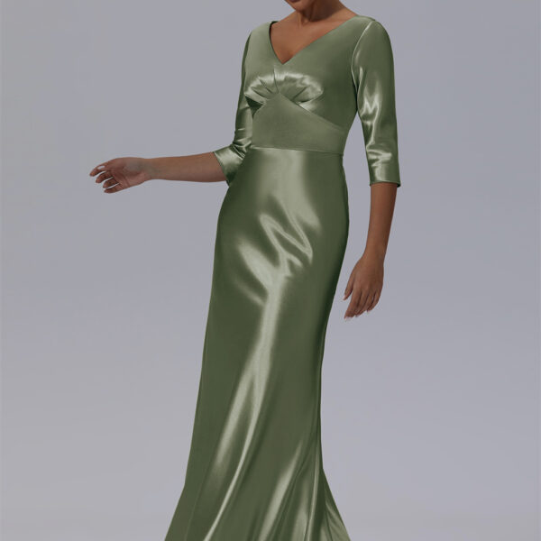 adorned with demure three-quarter sleeves. The Emmalina dress is the quintessence of chic poise