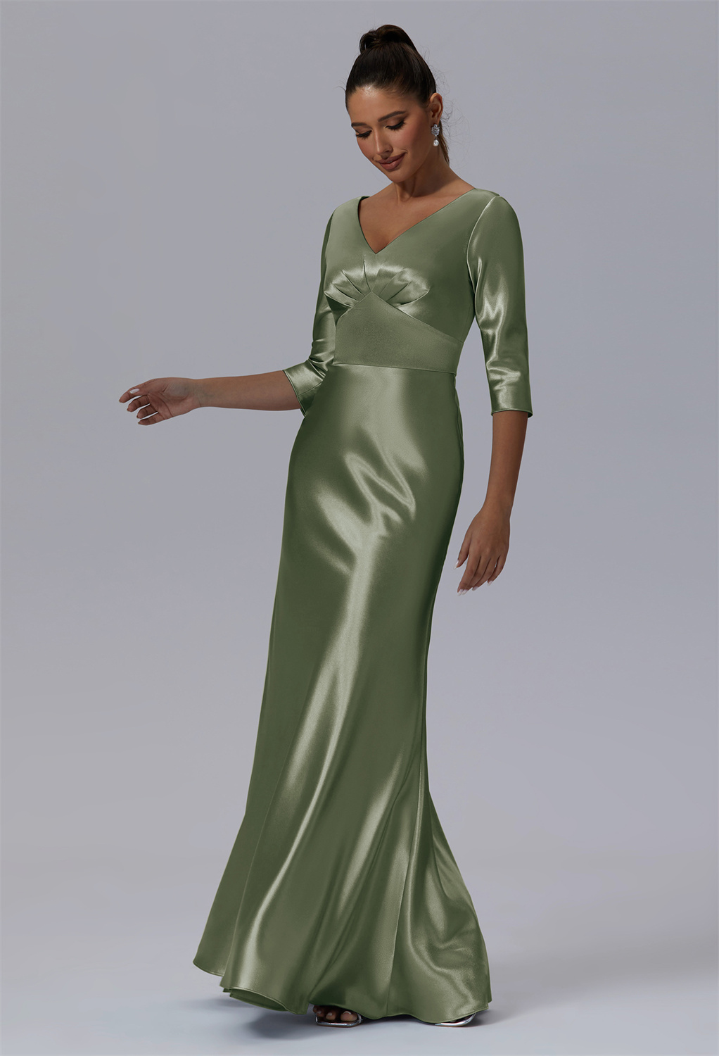 adorned with demure three-quarter sleeves. The Emmalina dress is the quintessence of chic poise