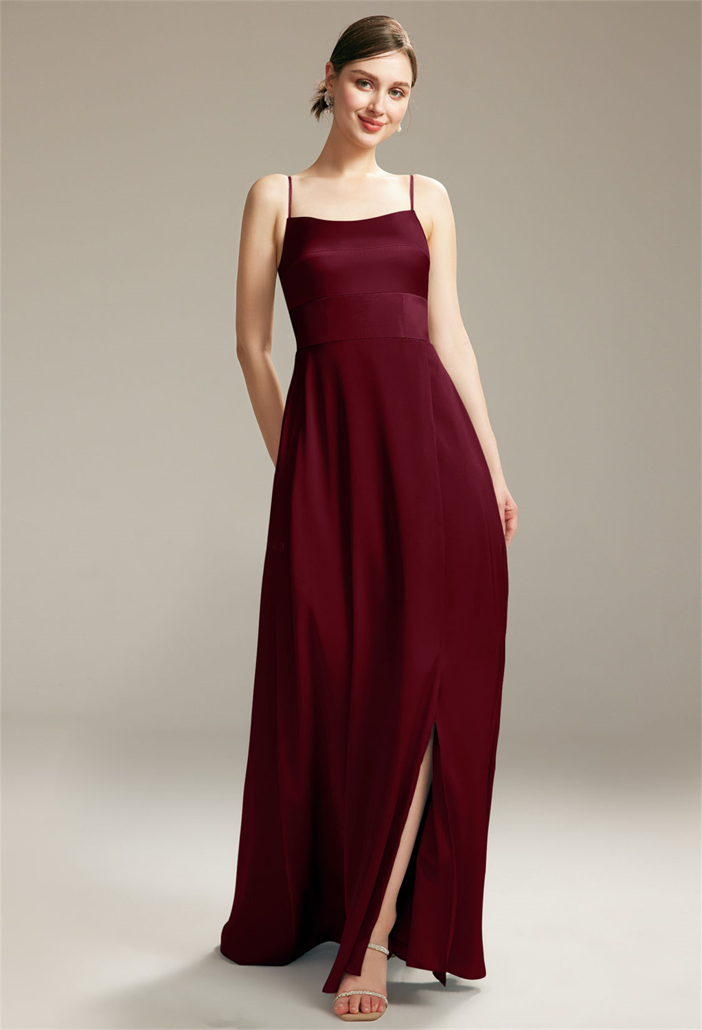this dress boasts a sleeveless cut with spaghetti straps