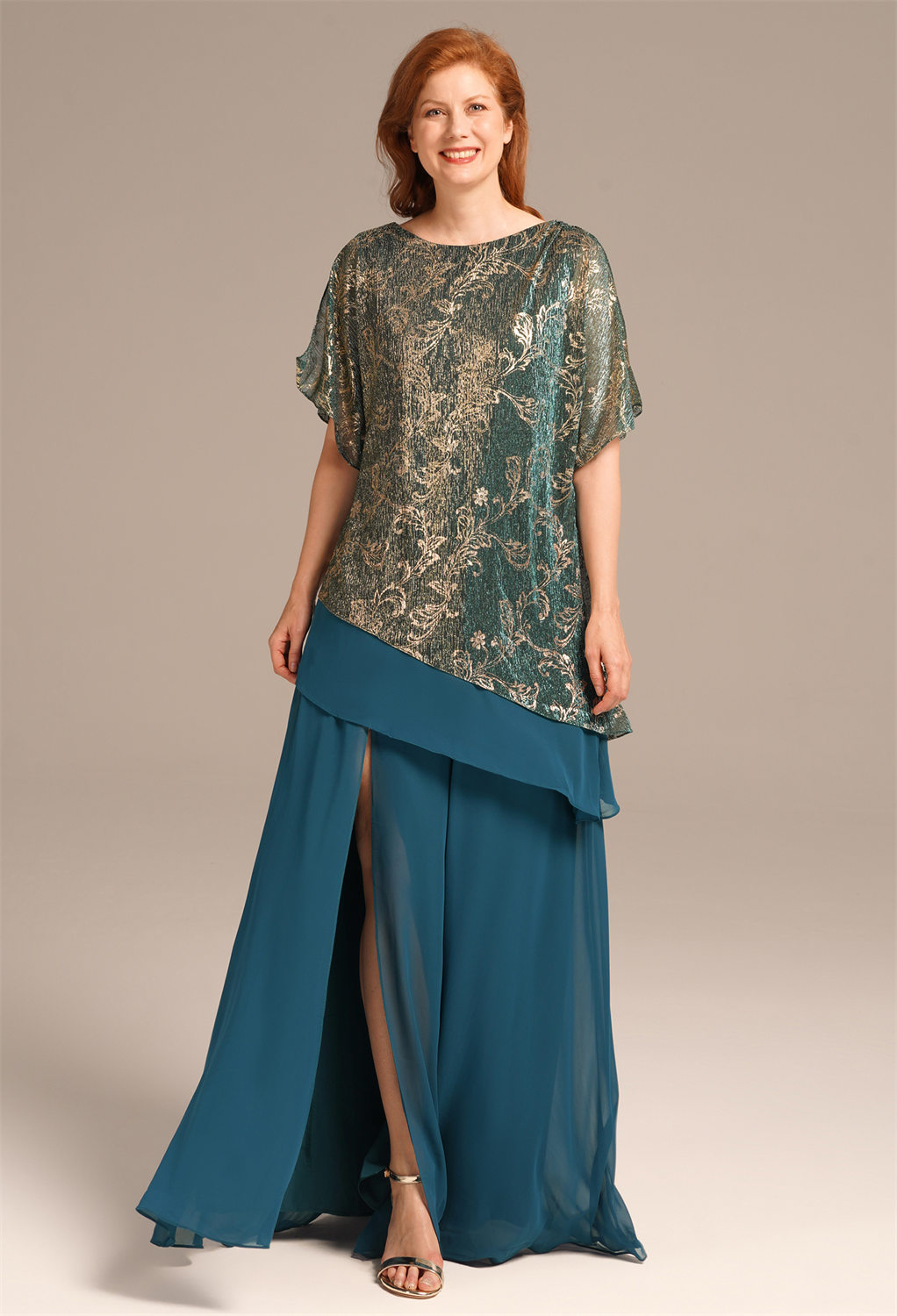 designed with shimmer pleated mesh and a floorl length cut to accentuate elegance at every turn.