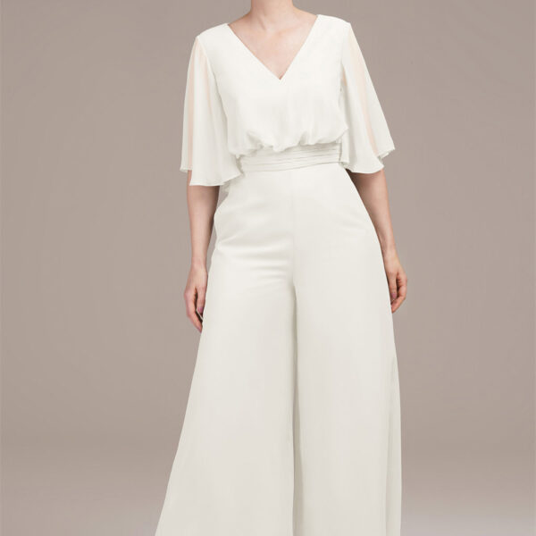 blending effortless style with comfort. Its straight-leg design creates a sleek contrast to the airy chiffon fabric. A side zipper and built-in bra ensure a seamless fit. It's the e