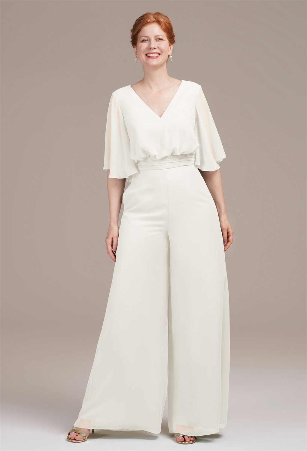 blending effortless style with comfort. Its straight-leg design creates a sleek contrast to the airy chiffon fabric. A side zipper and built-in bra ensure a seamless fit. It's the e