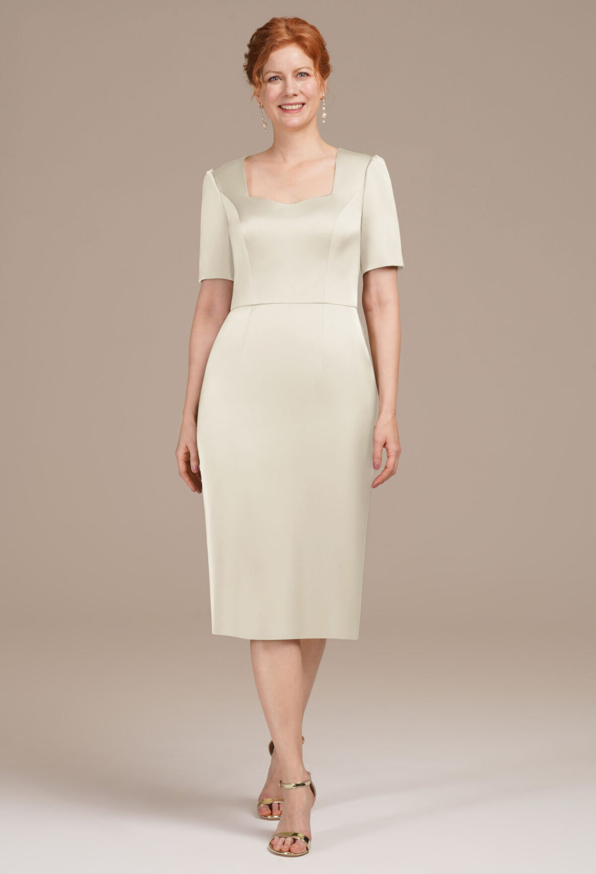 it showcases a striking asymmetrical neckline that commands attention