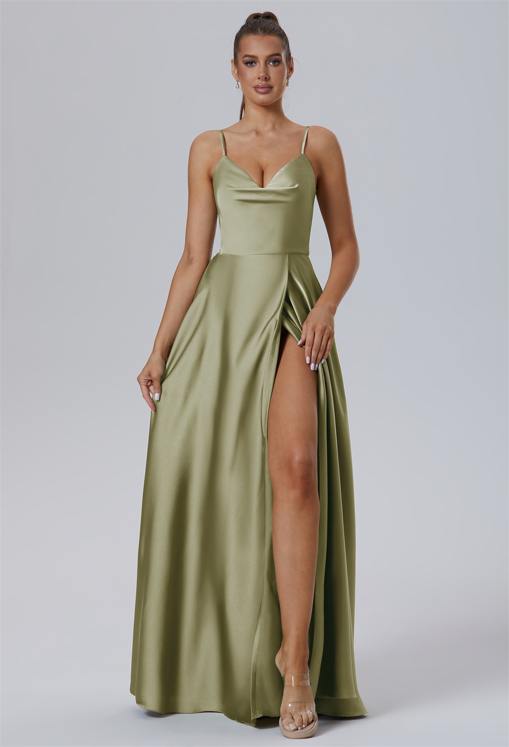 a floor-length A-Line beauty in Satin Charmeuse. This dress boasts a V-Neck and subtle spaghetti straps