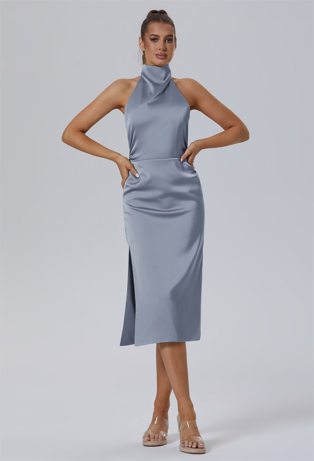 crafted from lustrous Satin Charmeuse. A tasteful halter neckline complements the semi-open back detail