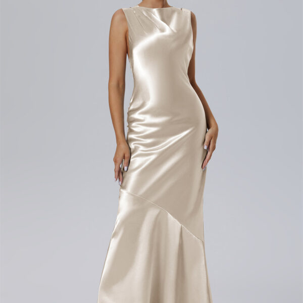 tailored in shimmering Crystal Satin. Its bateau neckline and sleeveless top are artfully balanced by distinctive straps draping down the back