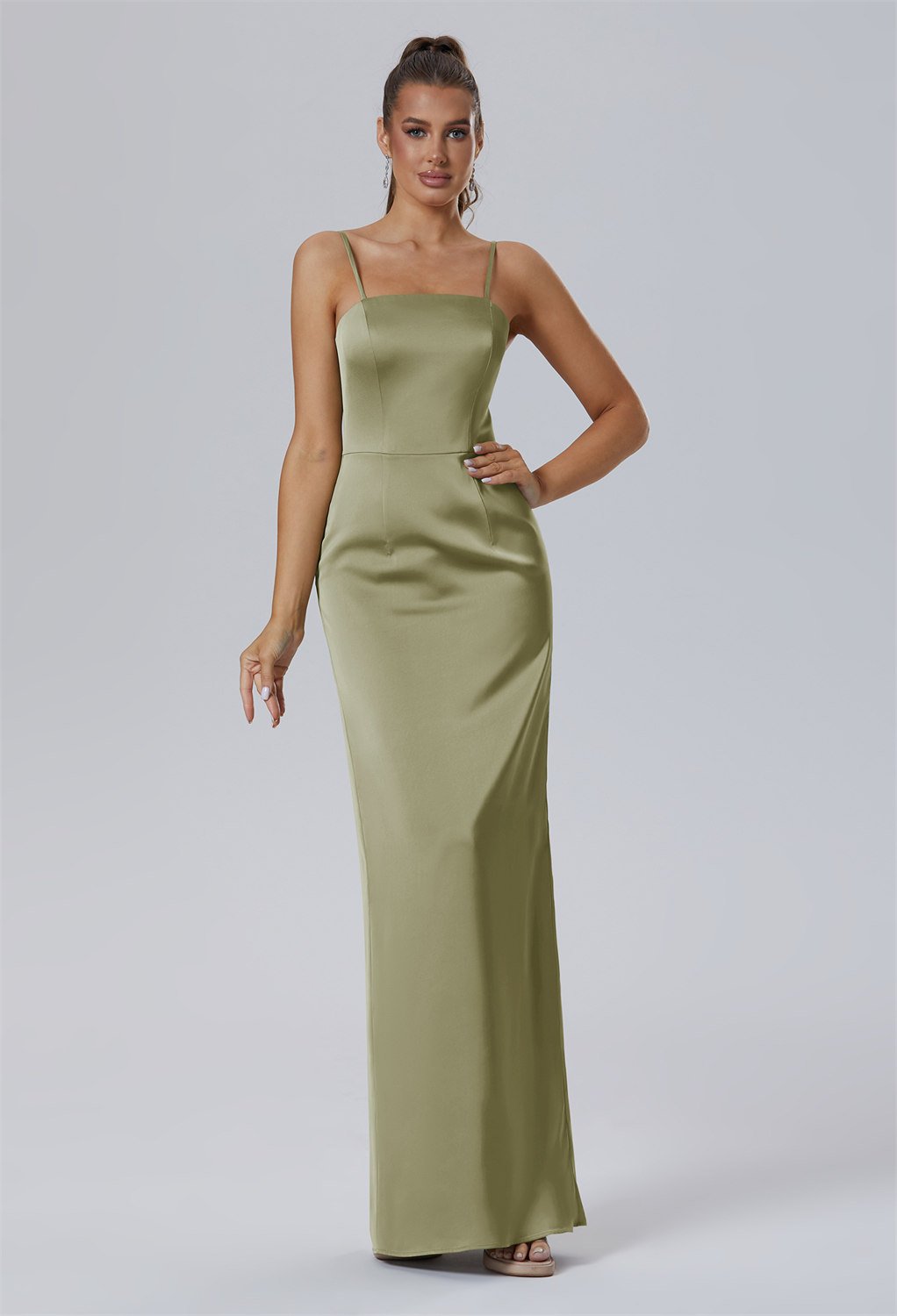 complemented by a tasteful square neckline and spaghetti straps. It features a built-in bra