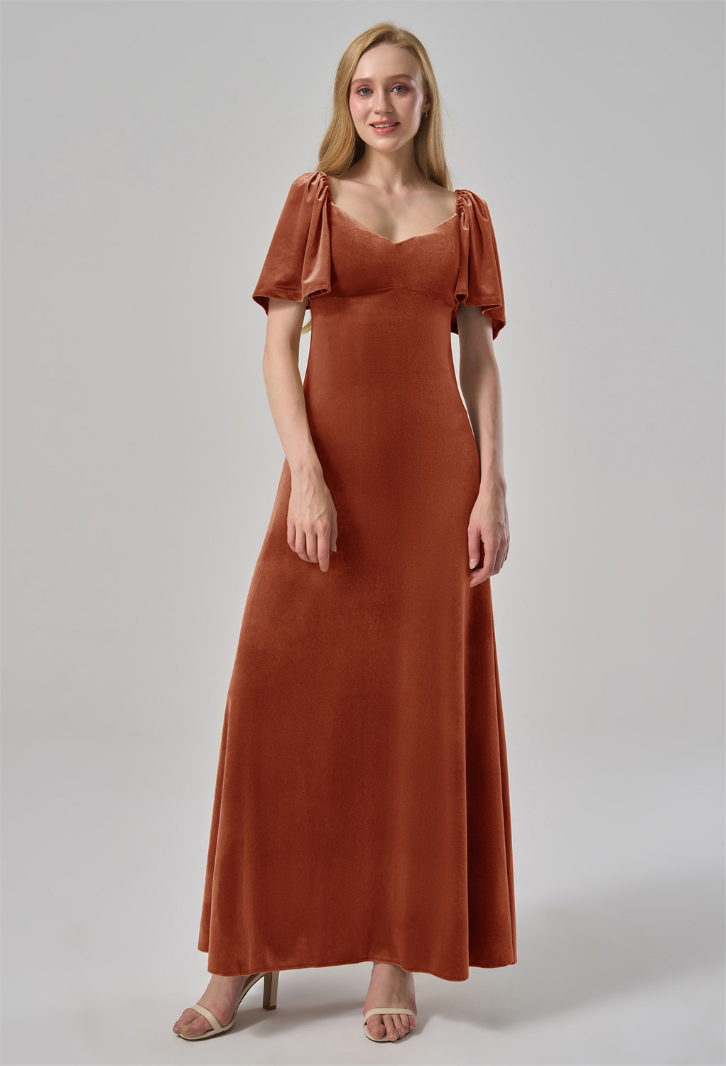 this dress features a v neckline and charming short butterfly sleeves